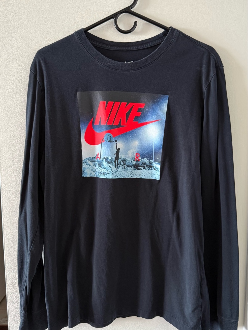 Nike Black Long Sleeve Tee with Red Logo Graphic